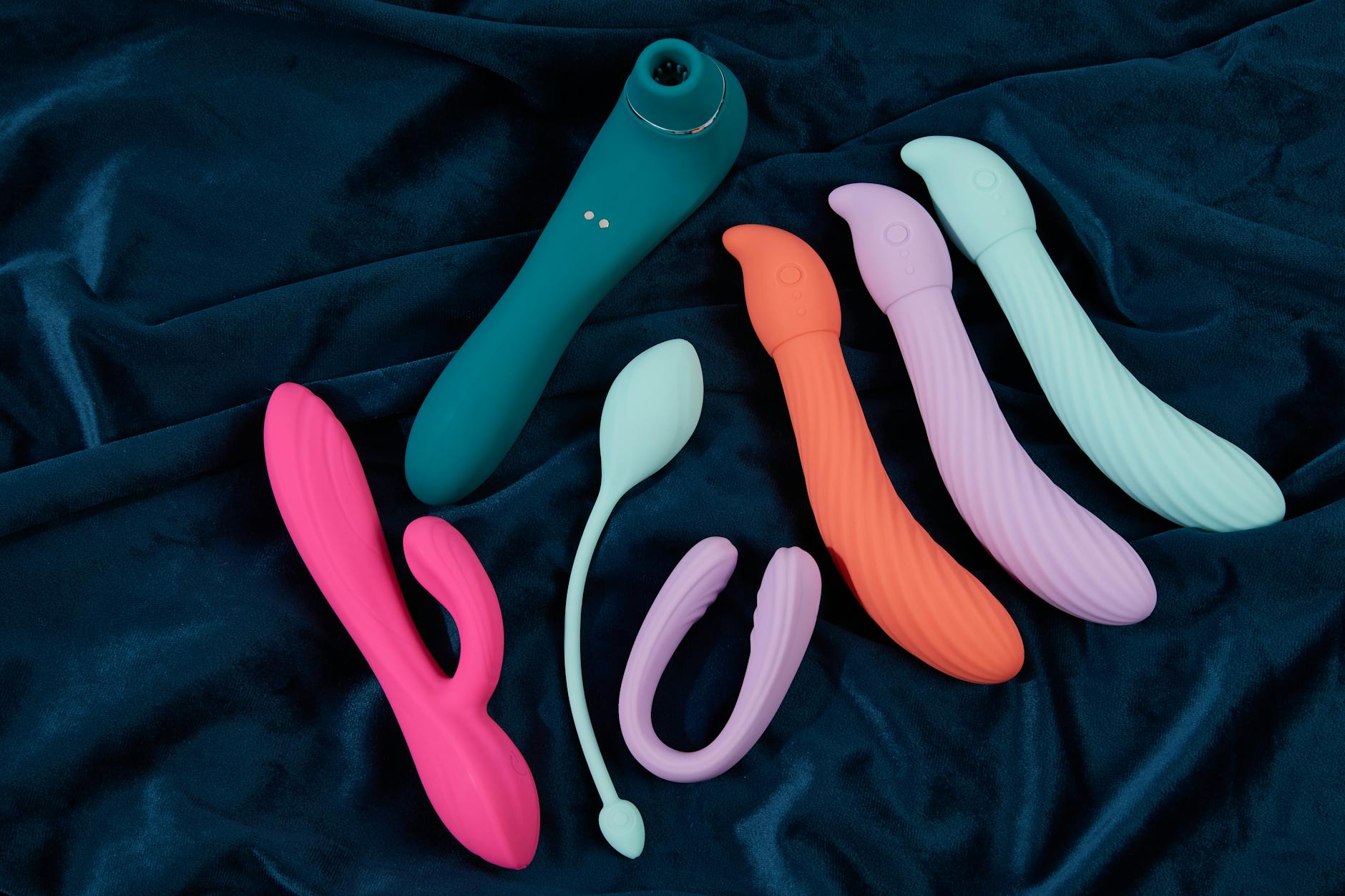 Yellow vibrator on minimalist background symbolizing energy and pleasure